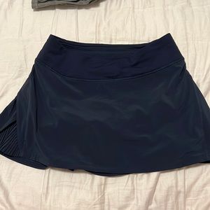 Play off the pleats - Lululemon Navy Skirt - Size 4